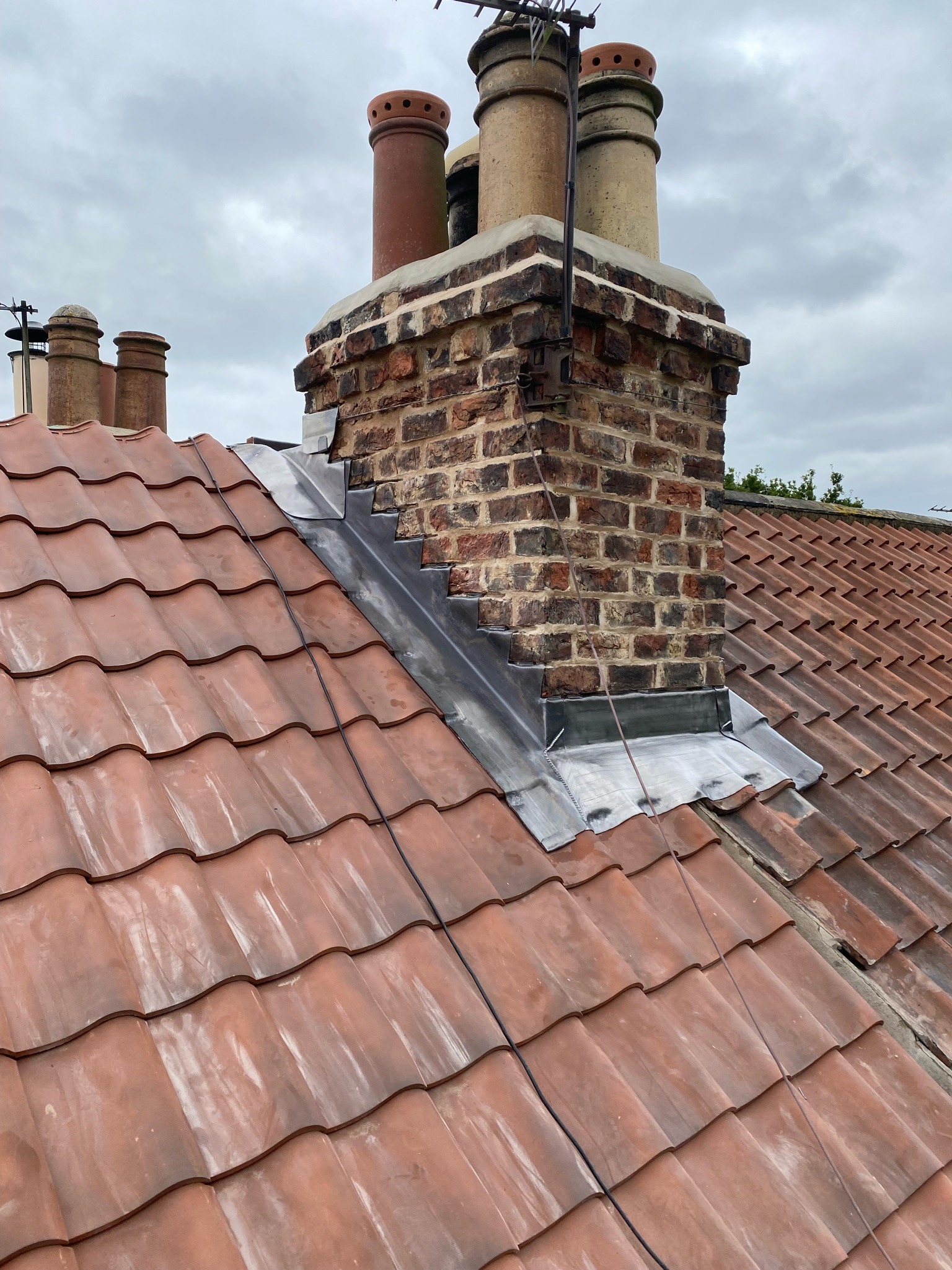 lead flashing to chimneys